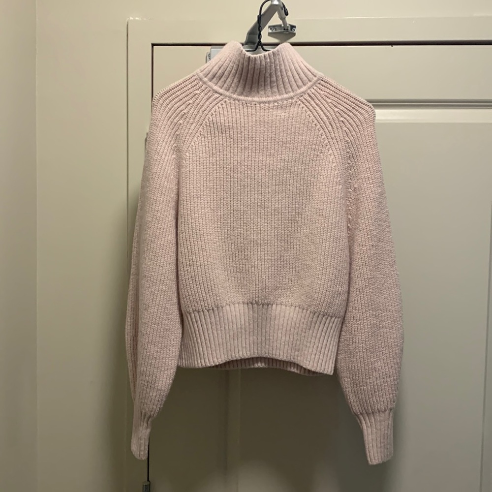 Pink turtleneck